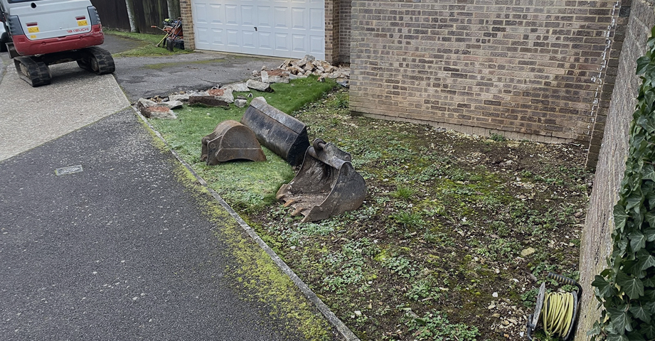 Garden landscaping — turfing, fencing, decking and drainage